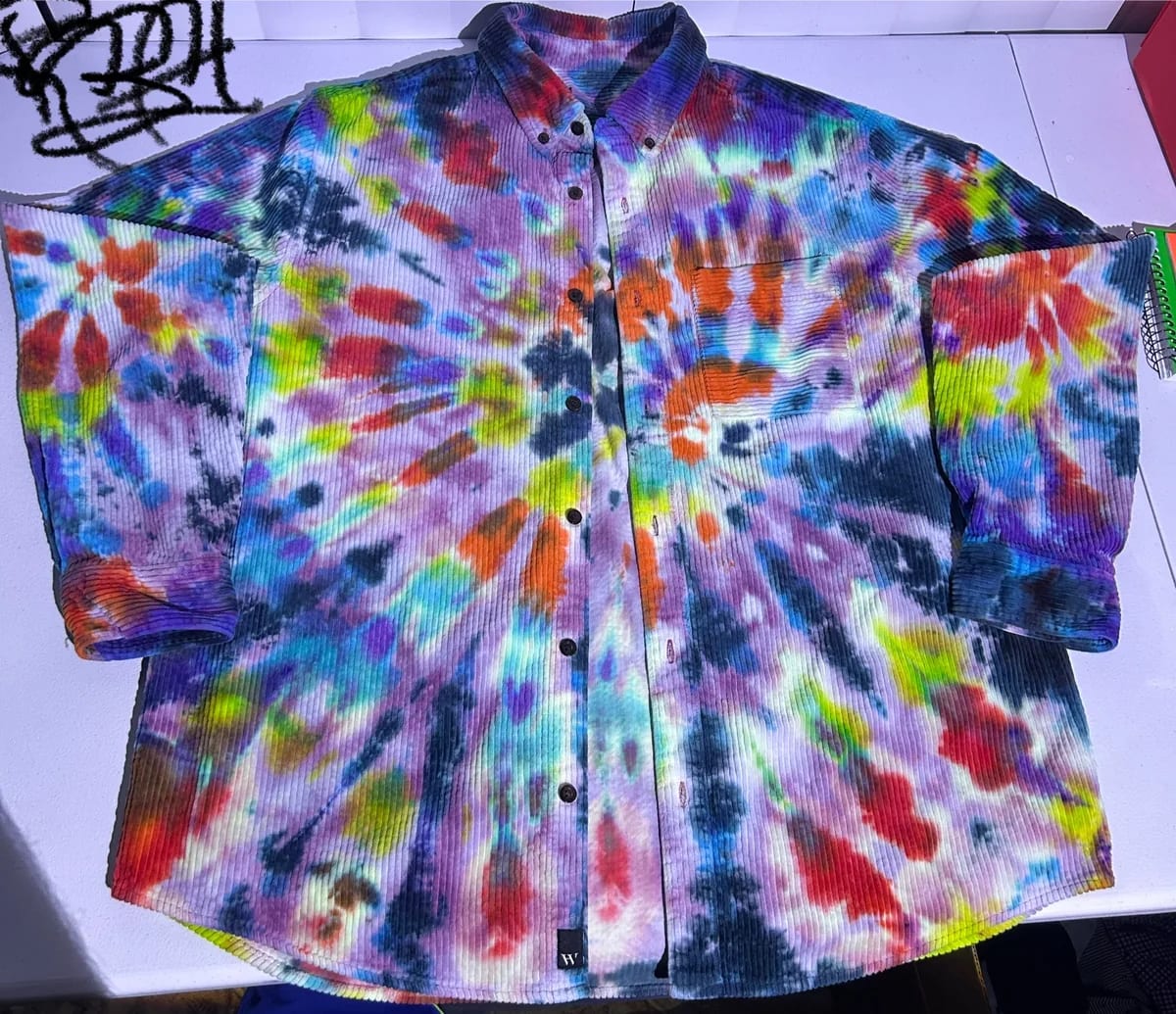 Corduroy button-up dyed with layered violet, blue, orange, and lime color